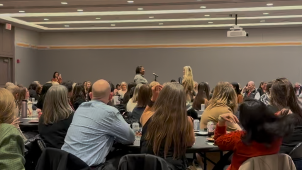 Audience listening to the speaker at a Women in Construction 2025 workshop.