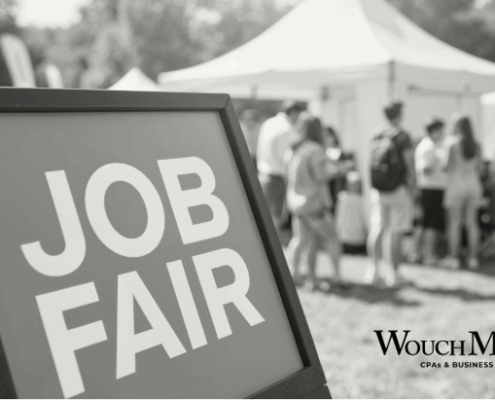 Image of job fair sign for article on tips for making the most of your time at a college career fair.