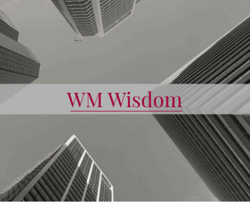 Tops of buildings reaching the sky.